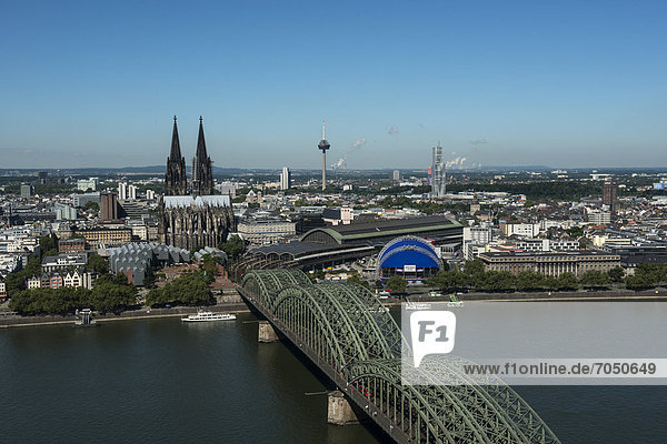 View of the historic district  Museum Ludwig  Cologne Cathedral  the Opernzelt concert tent and Hohenzollernbruecke bridge seen from above  Colonius Tower and Koeln-Turm tower at the back  the Rhine river in the foreground  Cologne  North Rhine-Westphalia  Germany  Europe