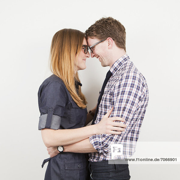 Studio Shot  portrait of young couple