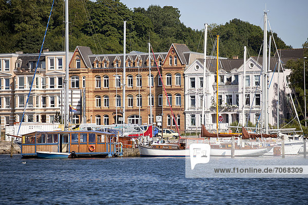 Sailing boats on the harbour promenade  Flensburg  Schleswig-Holstein  Germany  Europe