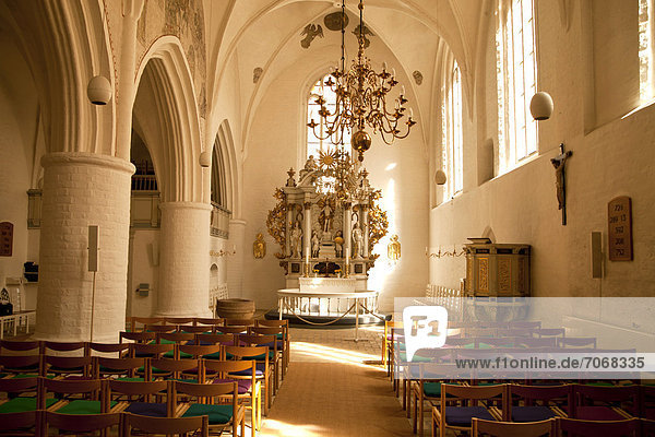 Interior and altar of Holy Spirit Church or HelligÂndskirken  main church of the Danish Church in Flensburg  Schleswig-Holstein  Germany  Europe