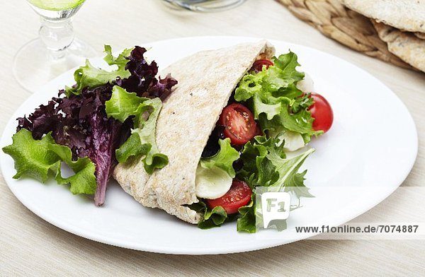 Pita Bread Stuffed with Salad and Mozzarella Cheese