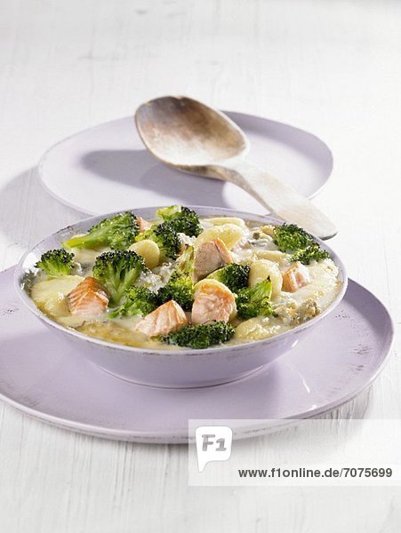 Gnocchi with salmon and broccoli in a creamy cheese sauce