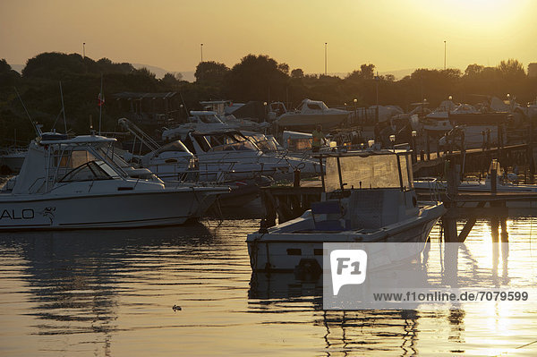 Boats in the port at sunset  Ognina  Siracusa  Syracuse  Sicily  Italy  Europe