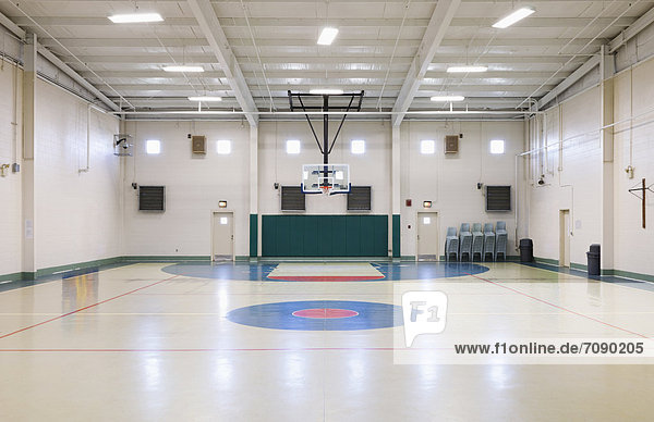 The prison gym and basketball court at a Correctional Facility.