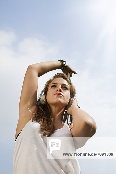Young woman listening music  close up