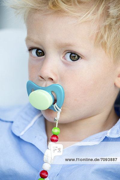 Germany  Portrait of boy with pacifier