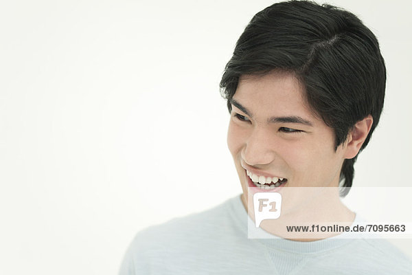 Young man laughing  portrait