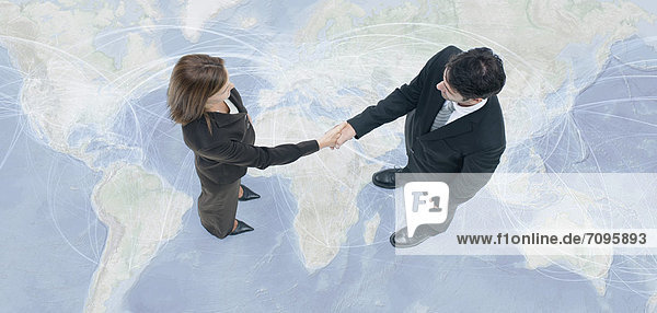 Business professionals engage in global business transactions