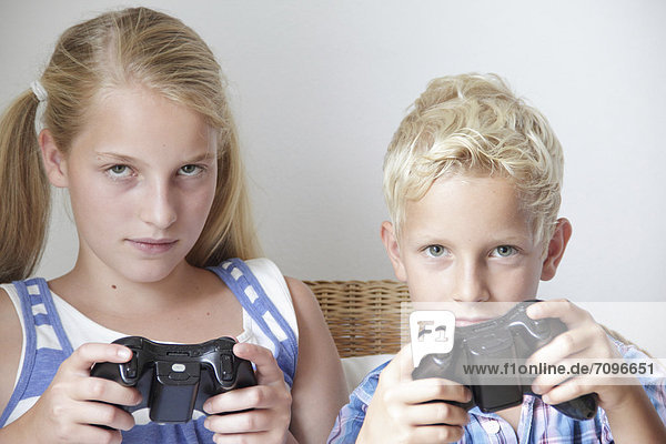 Children playing video games  game console