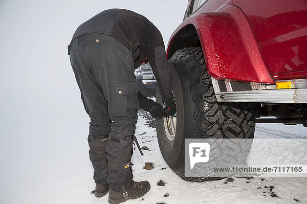 Deflating tyres  Super Jeep  Iceland  Europe