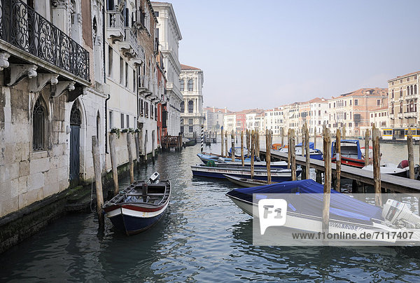 Jetty  boats on the Grand Canal  Canal Grande  view towards Palazzo Ca' Pesaro and Palazzo Gussoni-Grimani  Venice  Venezia  Veneto  Italy  Europe