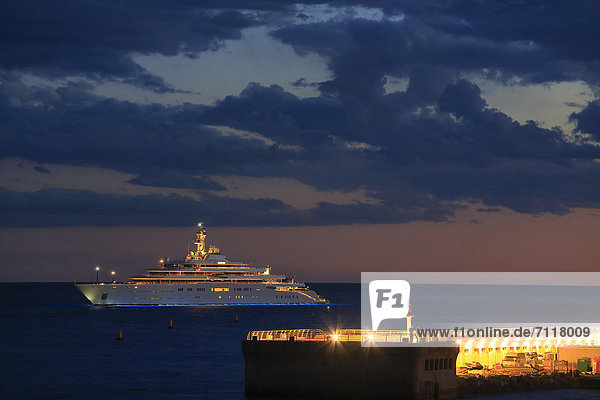 Eclipse cruiser at sunset  built by Blohm and Voss  length 162.5 meters  built in 2010  anchored off the Principality of Monaco  French Riviera  Mediterranean Sea  Europe