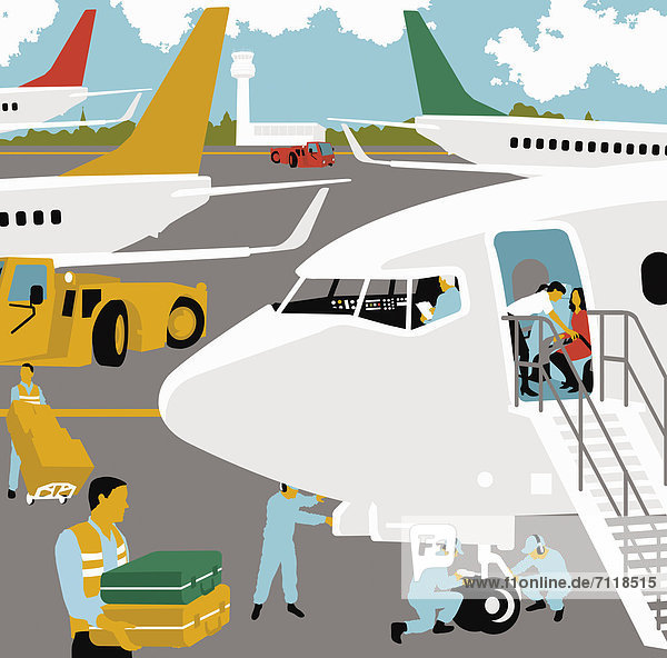 Flughafenmitarbeiter bereiten Flugzeug für eine Reise vor