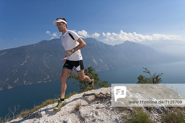 Trailrunning  man  sport  run  walk  jogging  Trail  lake Garda  running  mountain run  lake Garda  health  recreation  fitness  Running  mountain  Italy