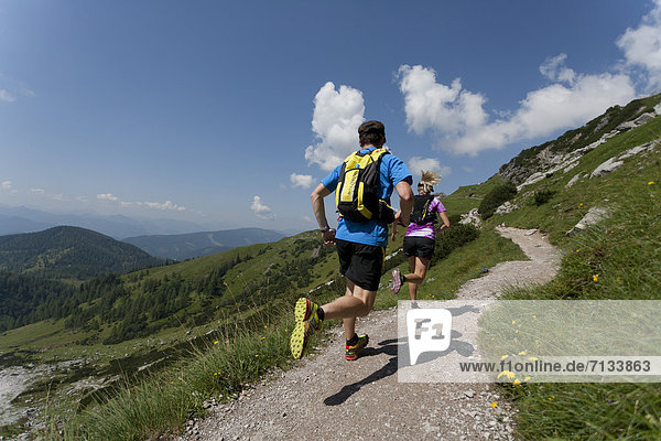 Trailrunning  Trail running  Trail  Ramsau  Dachstein  Styria  Austria  couple  woman  man  precipitous  steep  running  walking  run  mountains  mountain run  jogging  sport  fitness  health
