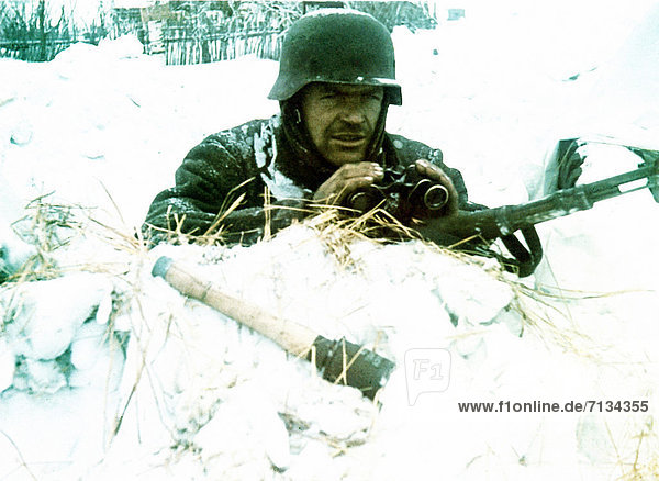 Operation  Barbarossa  Wehrmacht  soldier  winter  snow  hand grenade  gun ready  invasion  USSR  World War II  Soviet Union  1941