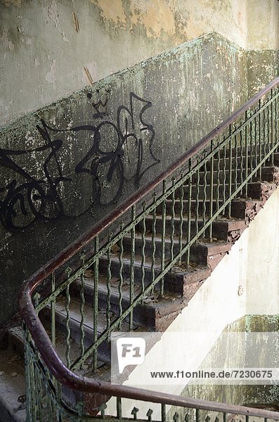 Staircase in a dilapidated building