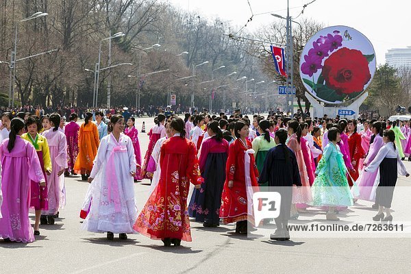 Women in traditional dress dancing during street celebrations on the 100th anniversary of the birth of President Kim Il Sung  April 15th 2012  Pyongyang  Democratic People's Republic of Korea (DPRK)  North Korea  Asia