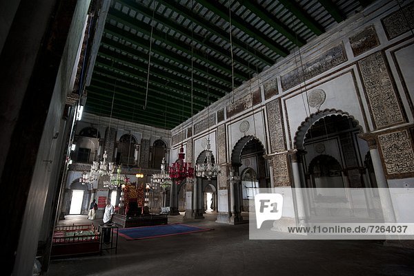 Mosque interior with holy dais and hanging glass lanterns  in the Hugli Imambara  on the bank of the Hugli river  West Bengal  India  Asia