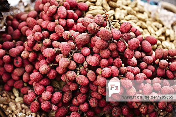 Close up of pile of lychee fruit