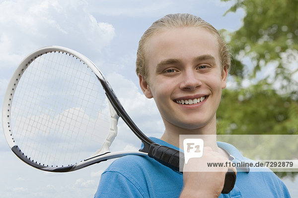 Jugendlicher  Europäer  Junge - Person  spielen  Tennis
