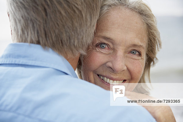 Spain,  Senior couple embracing each other,  smiling