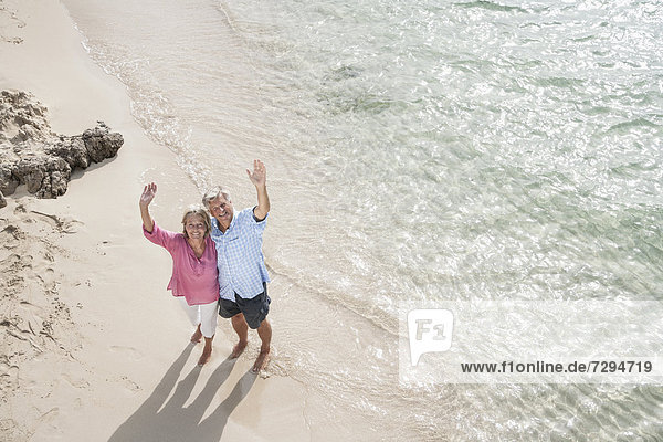 Spain  Senior couple standing on beach