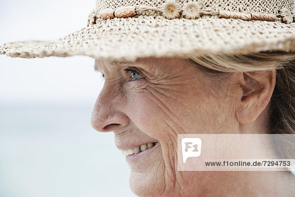 Spain,  Senior woman with straw hat,  smiling
