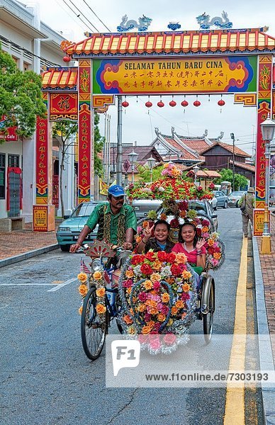 Mann  Blume  fahren  Großstadt  Asien  Malaysia