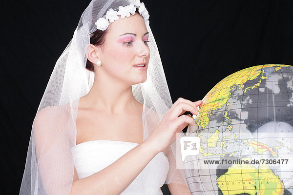 Bride deciding on a honeymoon destination