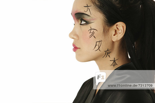 Young Filipino woman sporting a Geisha look