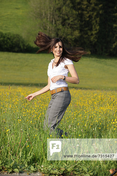 Woman  22 years  in a spring meadow
