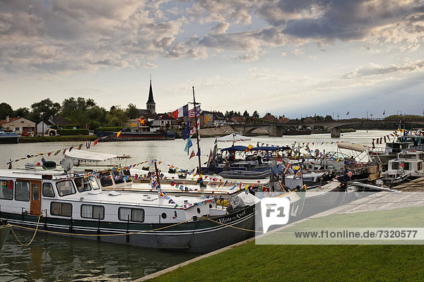 Boats decorated for the 42nd Pardon de marines  pilgrimage of the boatmen on the SaÙne and its banks  Saint-Jean-de-Losne  Dijon  Burgundy  CÙte d'Or department  France  Europe