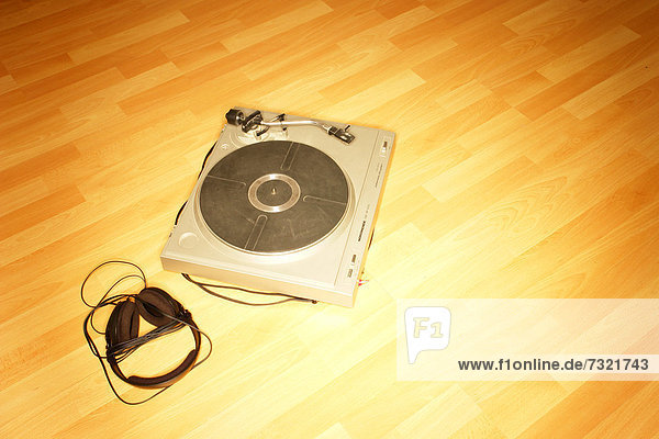Turntable on a wooden floor