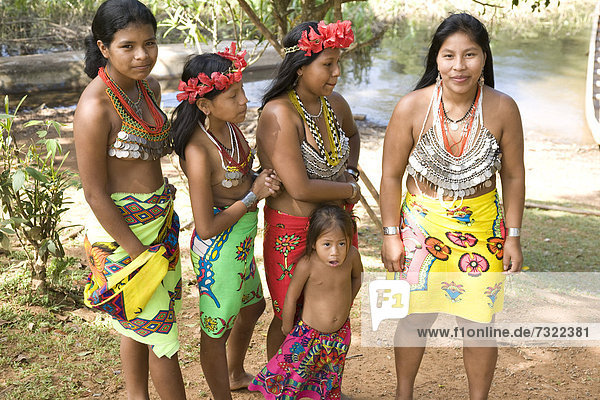 Young women with child. Embera Indian Village. Chagres National Park. Panama. Central America