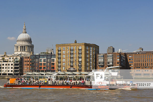 St Paul's Cathedral near the Millennium Footbridge  pedestrian bridge over Thames with Thames Clippers boat  City of London  from Bankside  London  United Kingdom  Europe