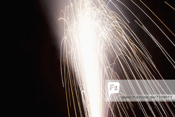 Sparks shooting from a firework