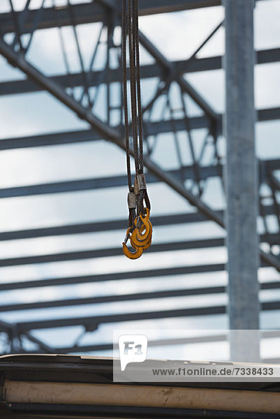 Crane Hook with construction frame in the background