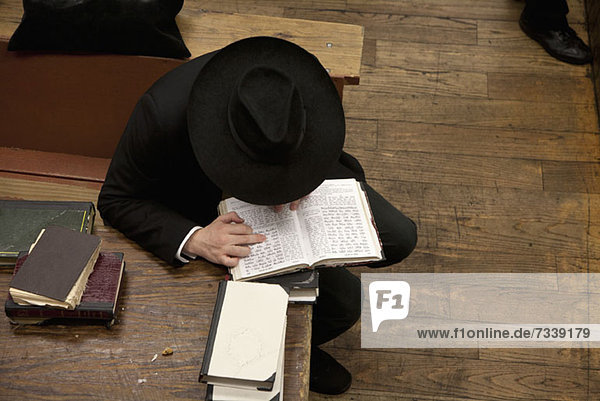 Jewish man reading religious text