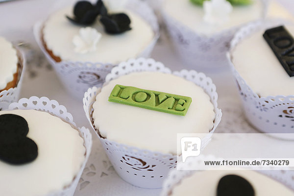 'Cupcakes  cupcake  lettering ''Love'' at a wedding'
