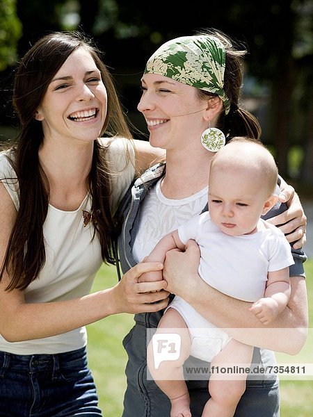 baby with her mother and aunt