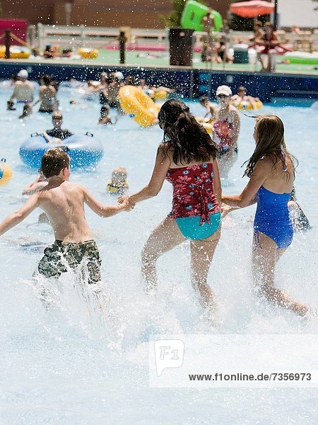 mother and two children at a waterpark
