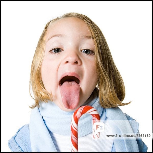 Portrait of a girl sticking her tongue out