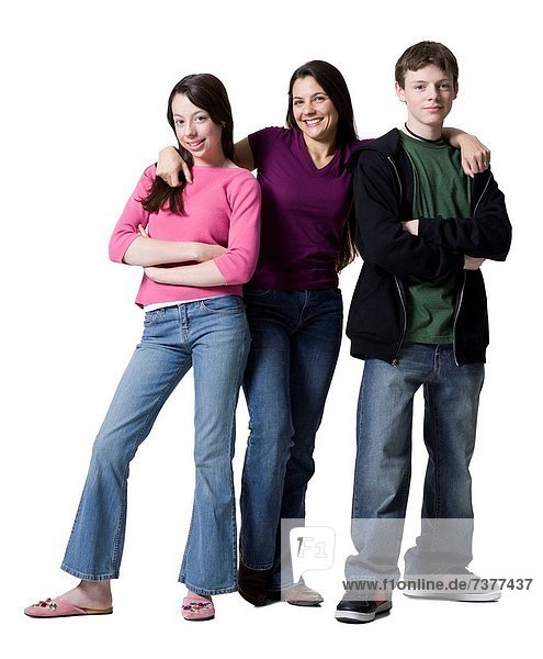 Mother posing with son and daughter