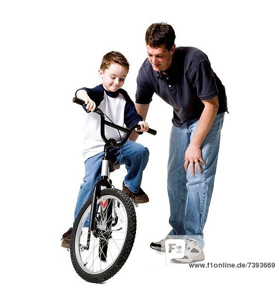Menschlicher Vater Sohn Fahrrad Rad