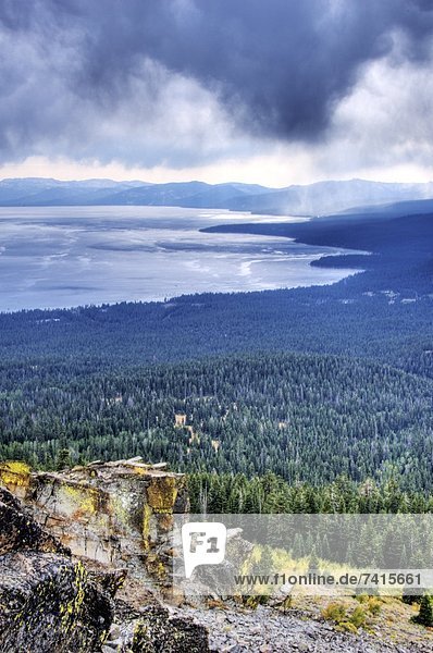 Storm clouds roll in over Lake Tahoe in the summer as seen from the Tahoe Rim Trail  CA.
