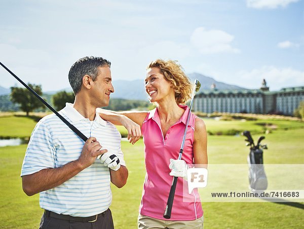 sprechen  Fröhlichkeit  Golfsport  Golf  Kurs