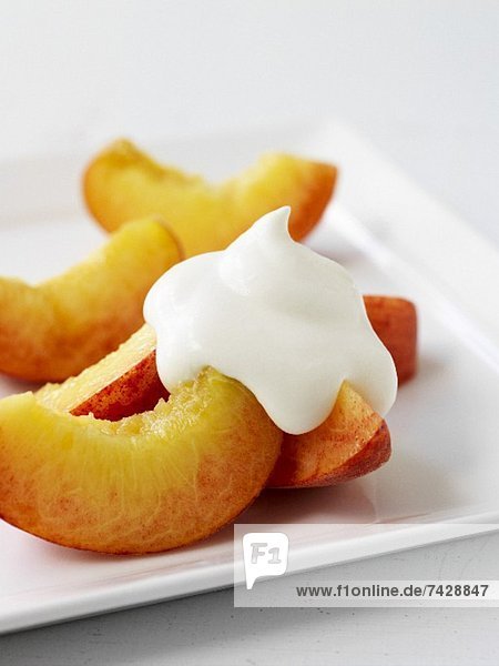 Peaches with a dollop of cream