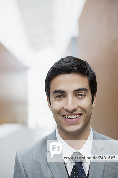 Close up portrait of smiling businessman