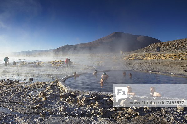 Tourists in hot springs of Termas de Polques on the Altiplano  Potosi Department  Bolivia  South America